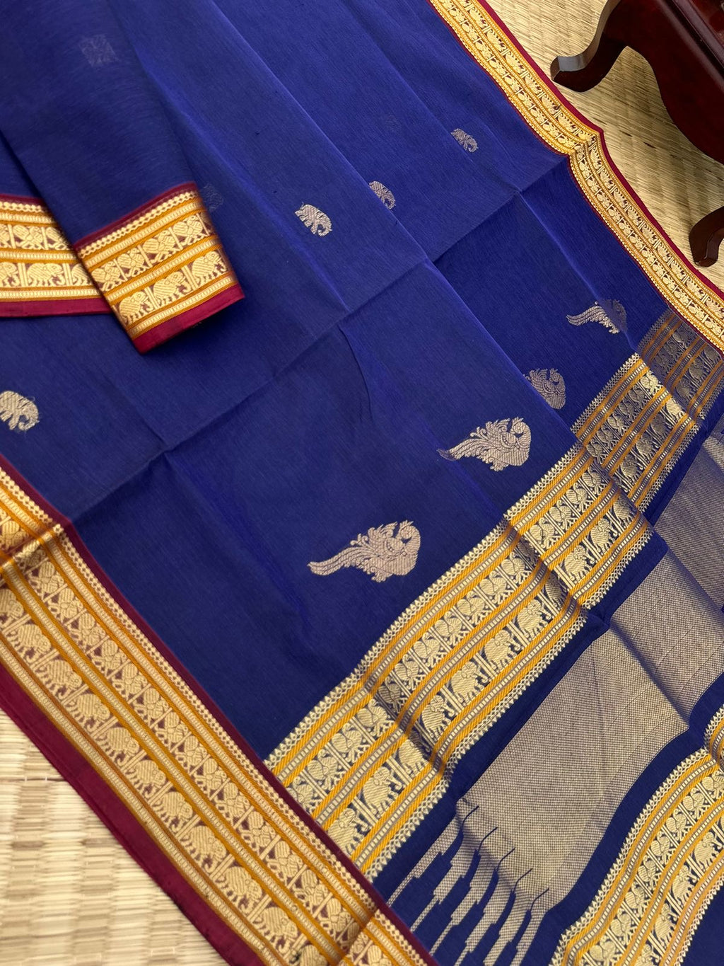 Dark Edition on Zari Kissed Silk Cotton - dark deep blue with one row of parrot woven buttas in the junction of pallu and blouse