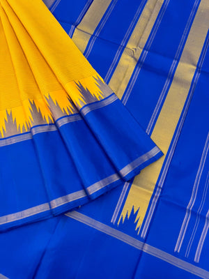Rarest Korvai Kanchivaram - mango yellow with stripes woven body with ms blue and green ganga jammuna woven korvai borders