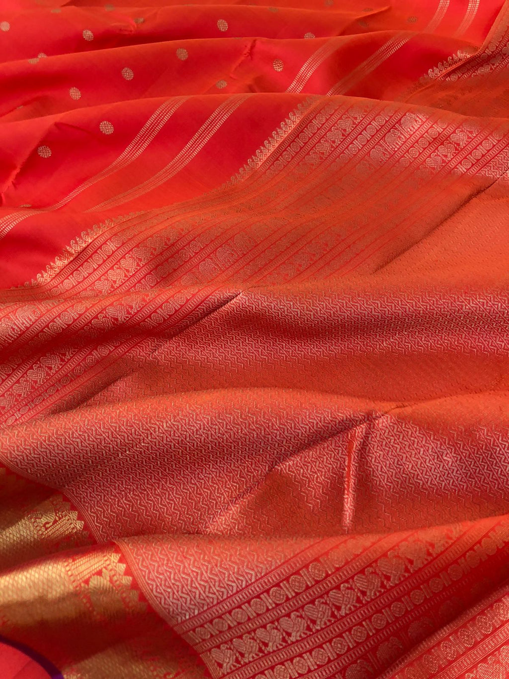 Swarnam - The Solid Kanchivarams - most beautiful traditional Kanchivaram orange and getti pett woven borders