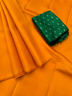 Niram - Celebrating of Full Plain Kanchivaram Silks Paired with Beautiful Blouses - Traditional mustard saree with bottle green raw silk blouse