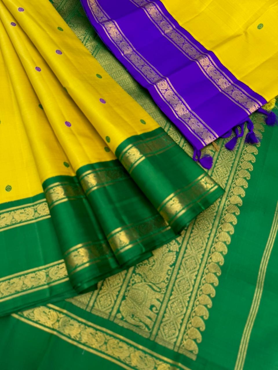 Vintage Ragas on Kanchivaram - a much loved sampanga yellow korvai Kanchivaram with retta pett ganga jammuna korvai borders with silk buttas woven body