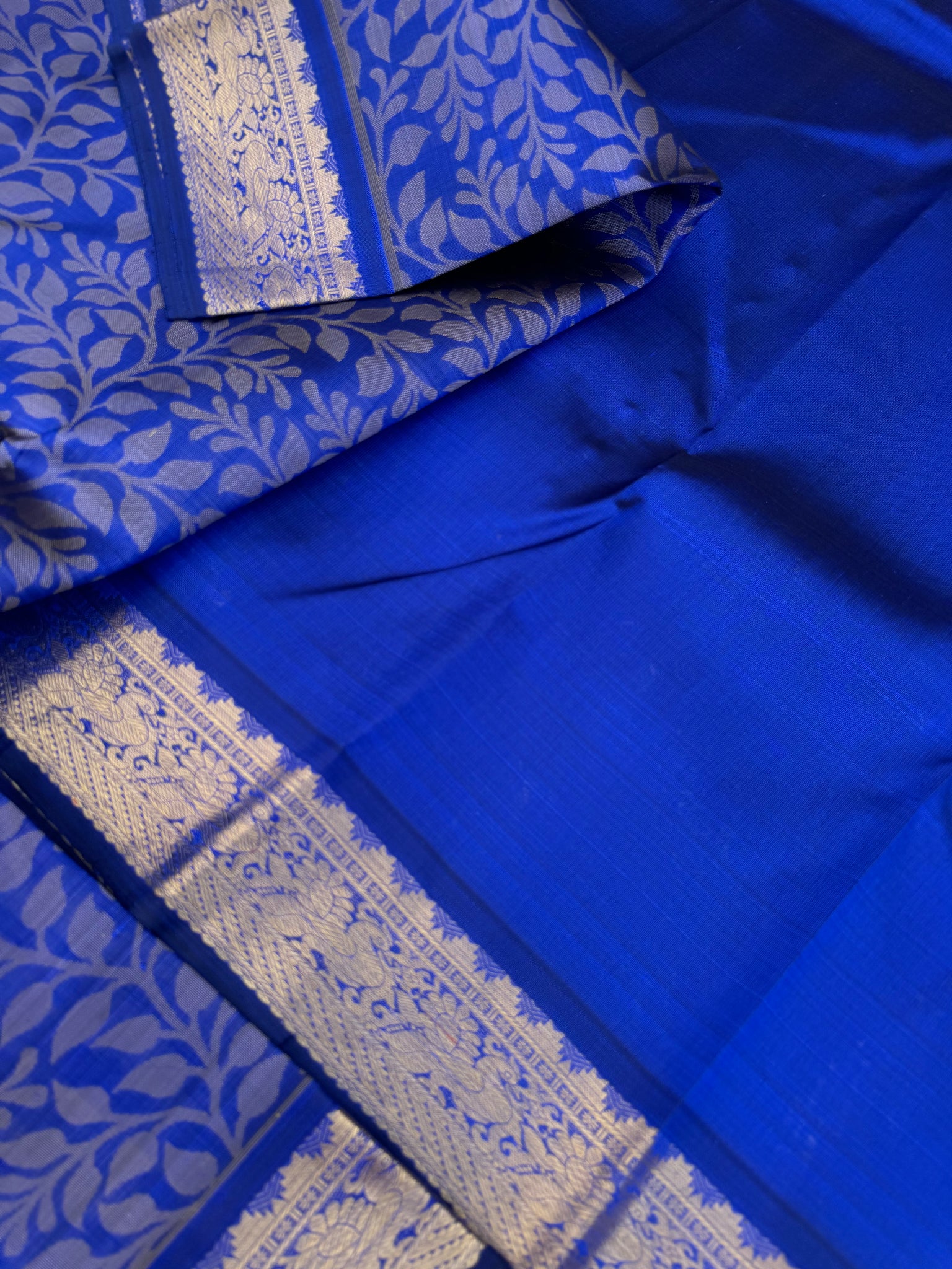 Haritham - Heirloom Yarn Play on Kanchivaram - stunning royal blue with full body woven leaves with gold zari woven borders and pallu