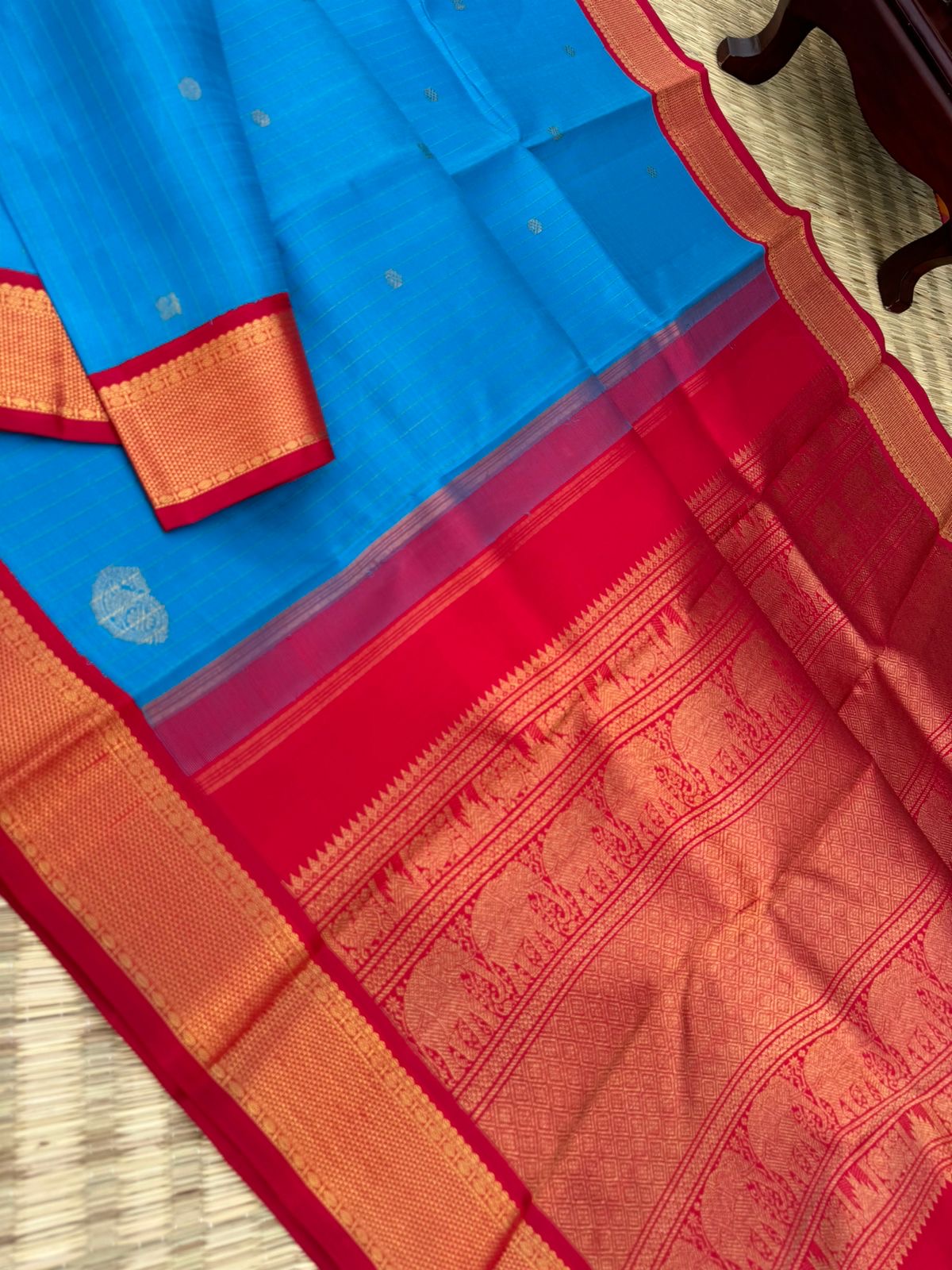 Kanchivaram Trunk - gorgeous Anandha blue and red with vertical zari strips and buttas with aarai maadam woven borders