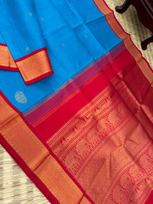 Kanchivaram Trunk - gorgeous Anandha blue and red with vertical zari strips and buttas with aarai maadam woven borders
