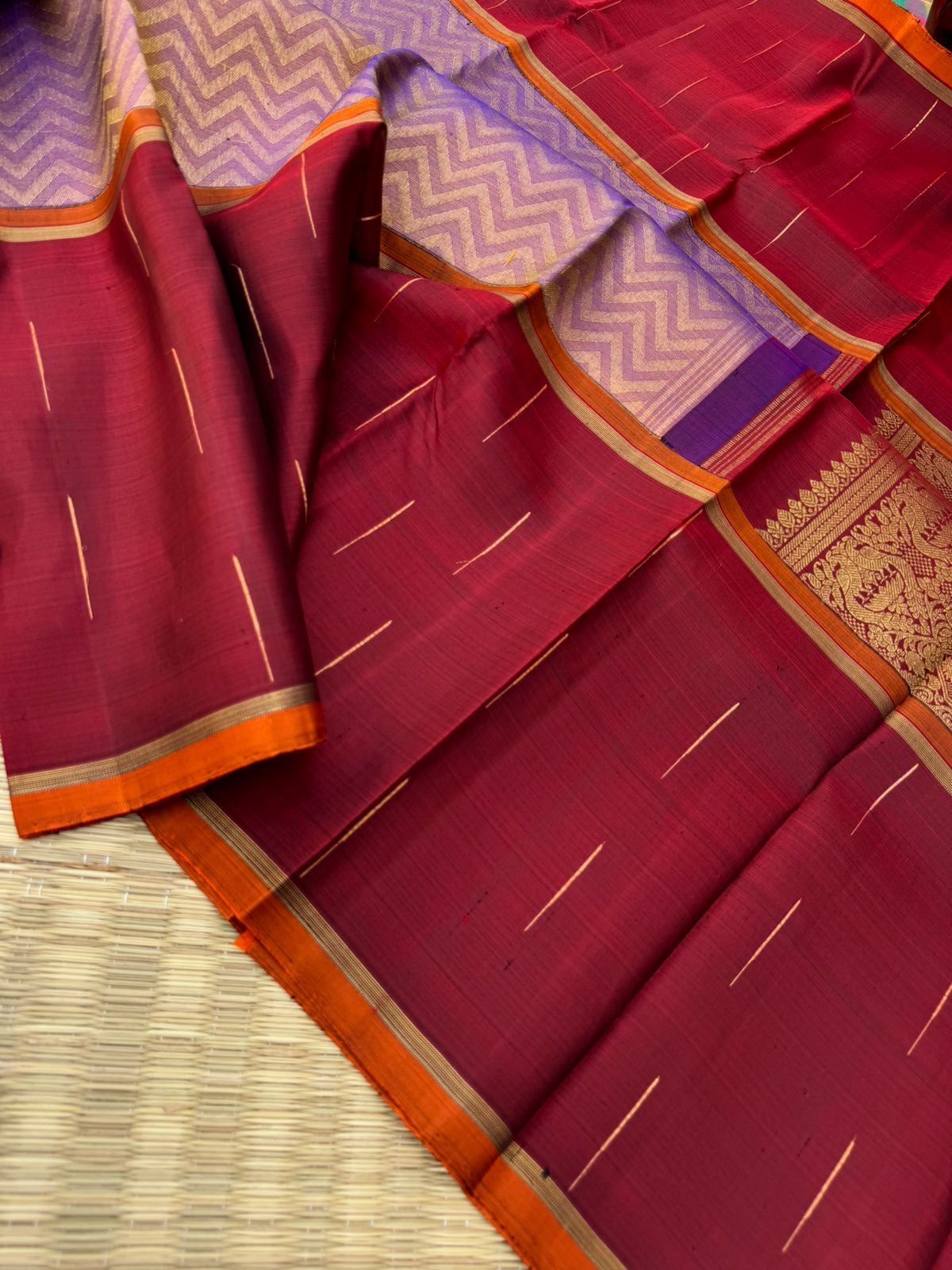 Tasteful Tall Border Kanchivarams - stunning lavender and gold Chevron V woven body with deep red long korvai woven borders with raindrops weave