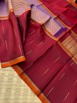 Tasteful Tall Border Kanchivarams - stunning lavender and gold Chevron V woven body with deep red long korvai woven borders with raindrops weave