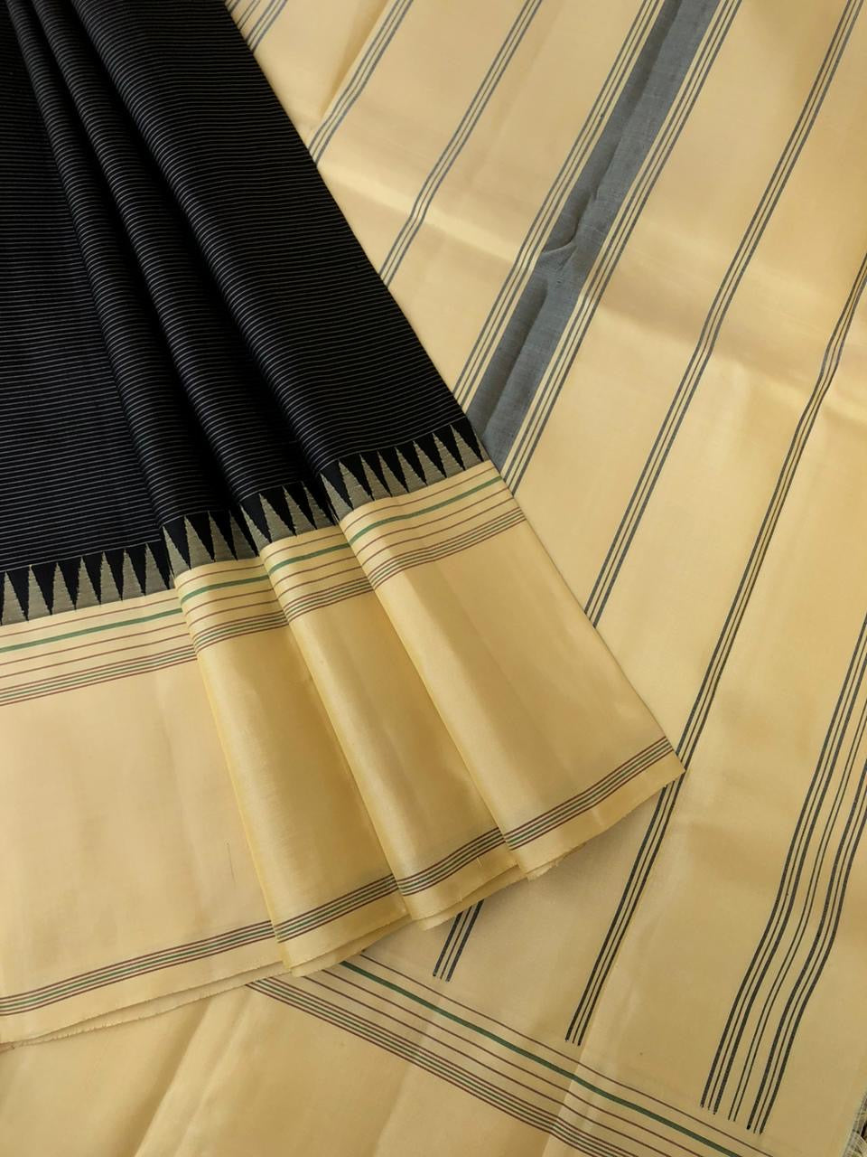 Kaavyam on Korvai Kanchivaram - the vintage beauty of black and cream off white ( venn pattu ) borders pallu and blouse