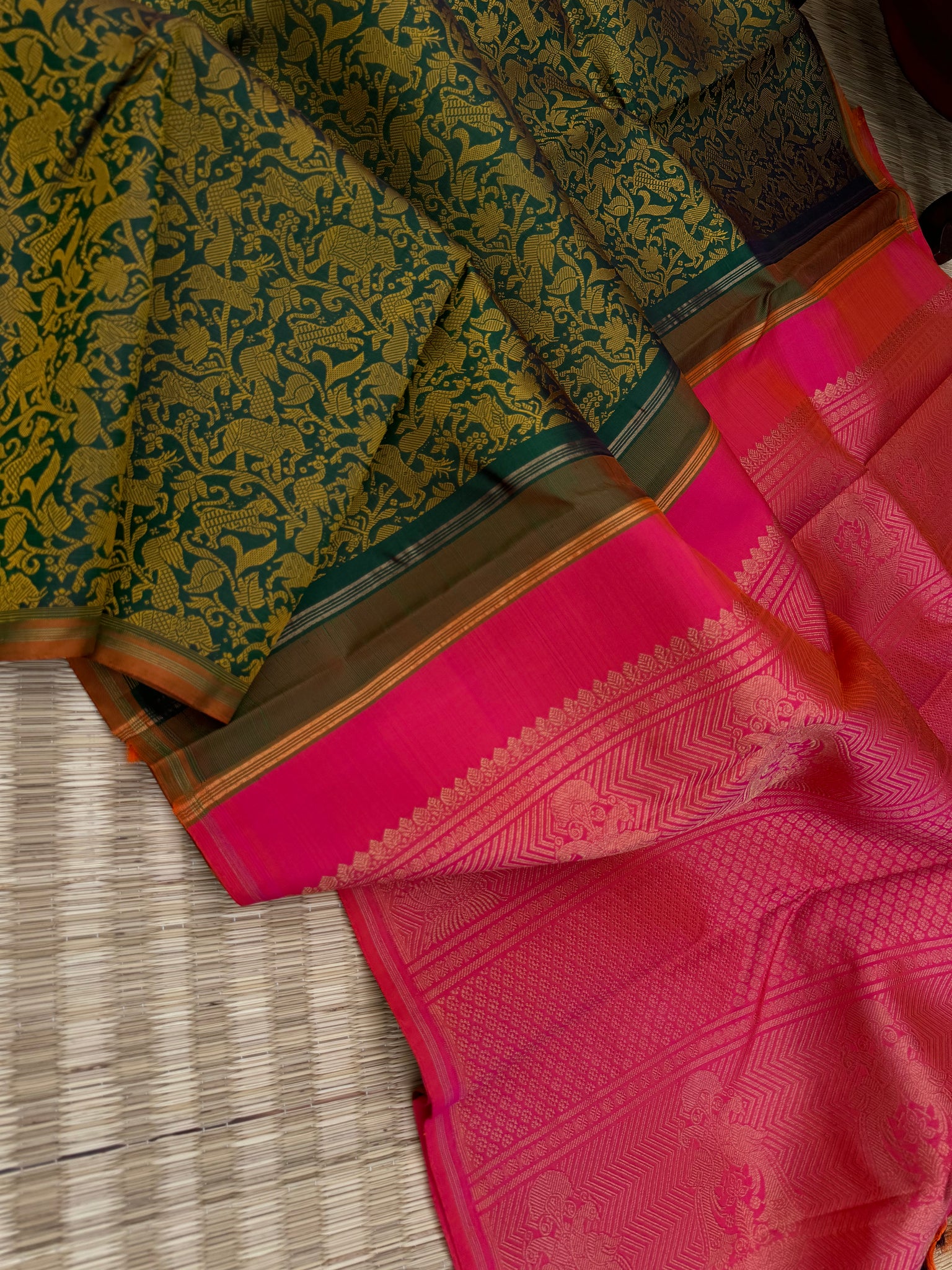 Haritham - Heirloom Yarn Play on Kanchivaram - a stunning deep green base and mustard silk weave vanasingaram with orangish pink dual tone pallu ans blouse
