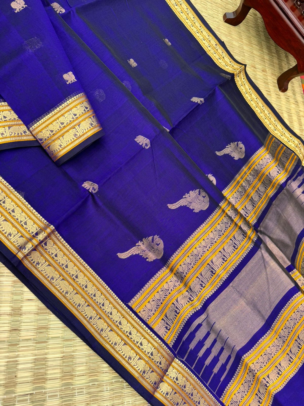 Zari Kissed Silk Cotton - the deep ink blue with classy konjum killi inbetween the body and pallu
