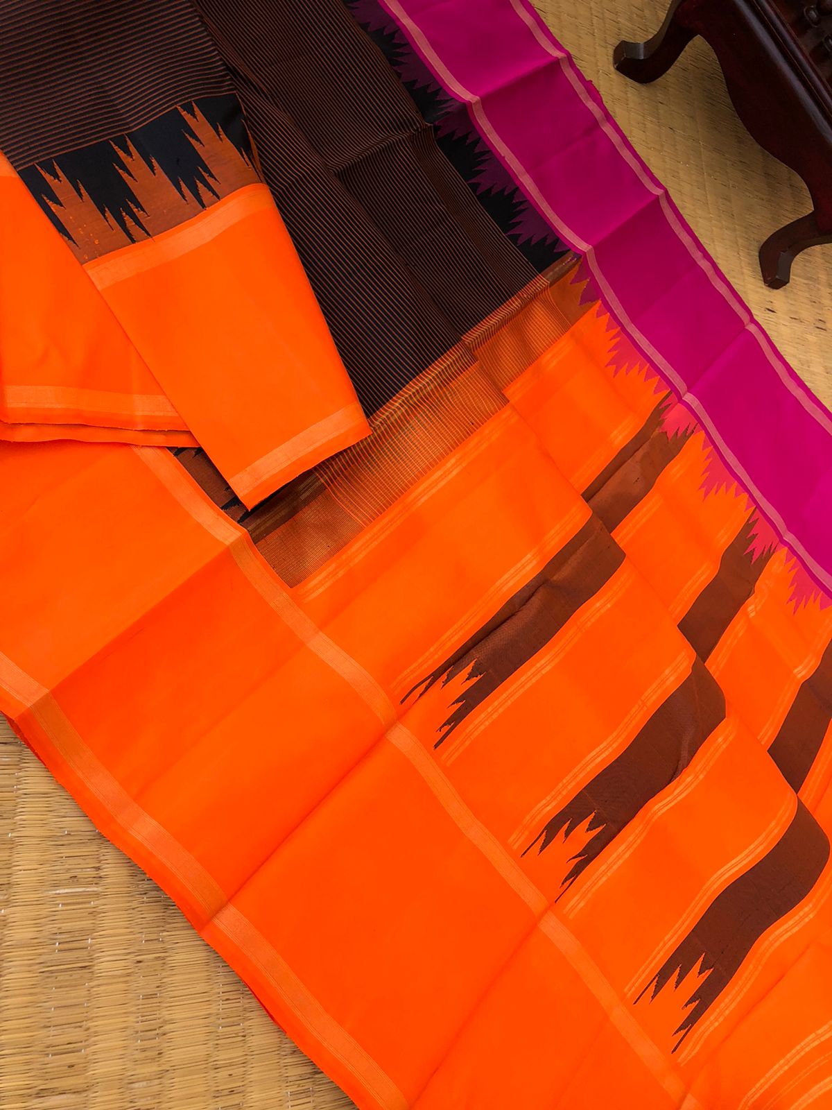Connected by Korvai on Kanchivaram - a beautiful black stripes body with orange and pink ganga jammuna woven borders