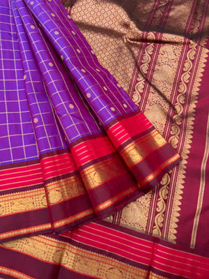 Vintage Ragas on Kanchivaram - a dual tone red short violet with all traditional elements of Kanchivaram in one saree !! Kattam buttas moppula everything