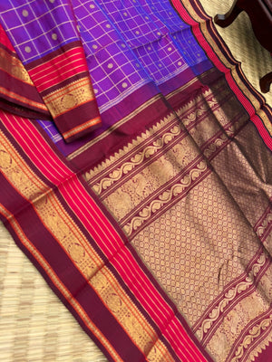 Vintage Ragas on Kanchivaram - a dual tone red short violet with all traditional elements of Kanchivaram in one saree !! Kattam buttas moppula everything