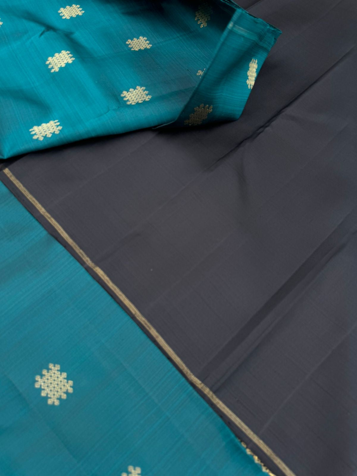 Mohaa - Rarest Borderless Kanchivarams - dark deep burnt blue/green ( a rare tone ) with grand black pallu and blouse