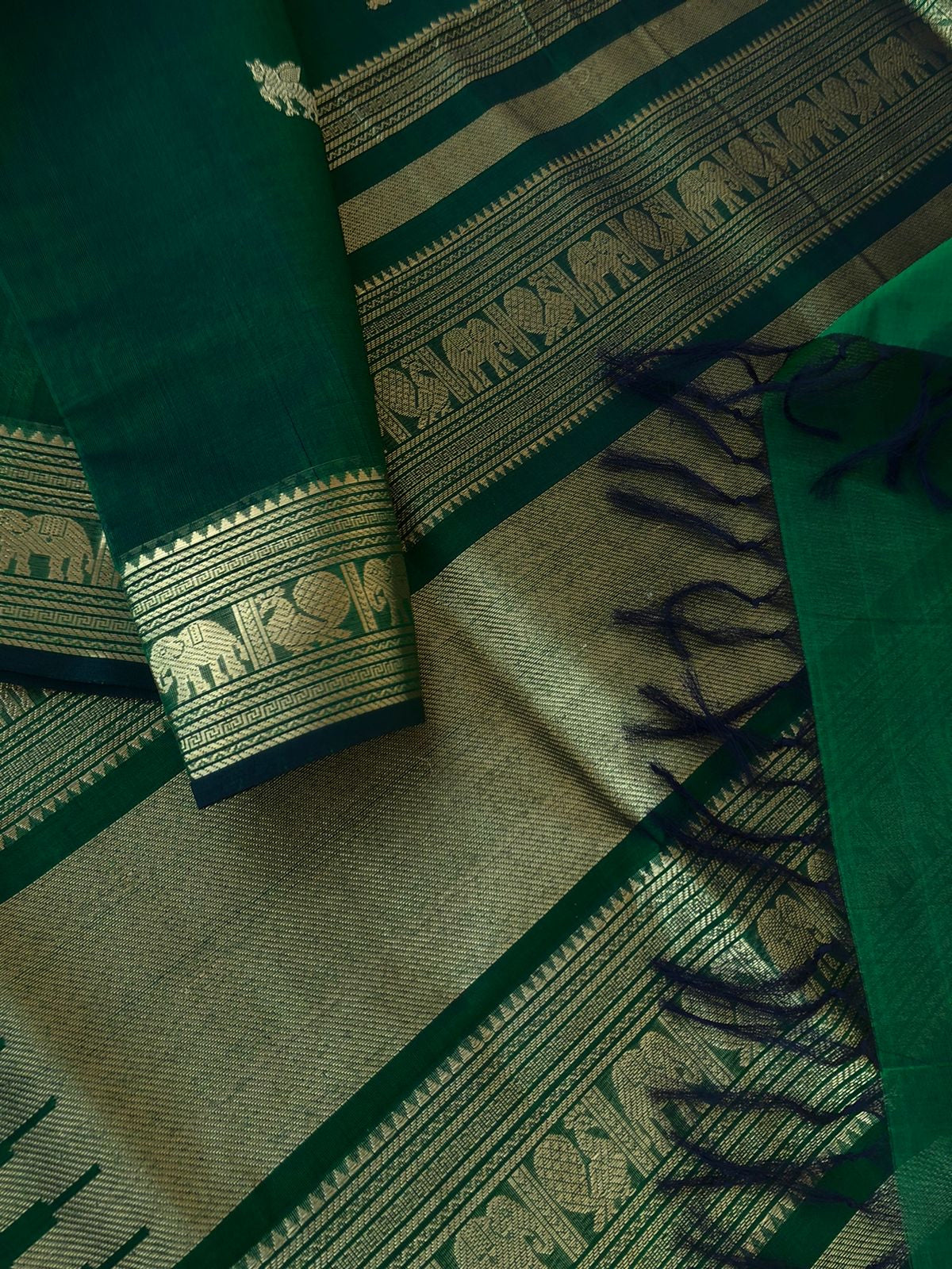 Zari Kissed Silk Cotton - the most traditional Meenakshi green with elephant and annapakshi woven borders