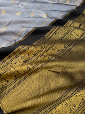 Mohaa - Beautiful Borderless Kanchivarams - stunning metallic grey and black with kolam buttas with grand woven pallu