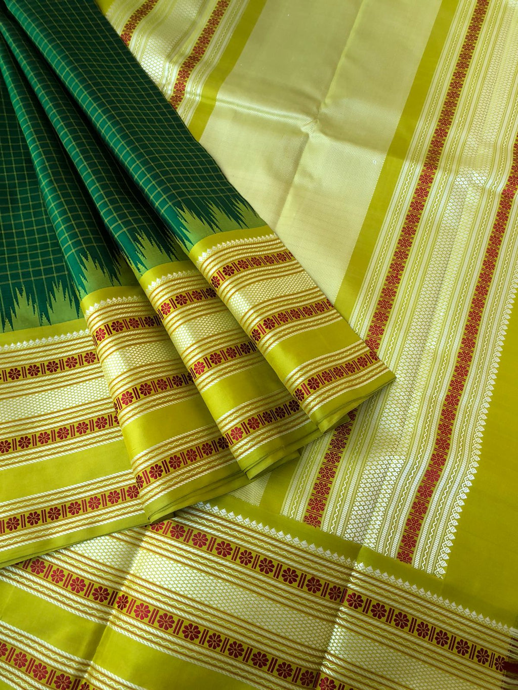 Silk Play on No Zari Kanchivaram - the most traditional green green with chex woven body with varusai pett woven borders