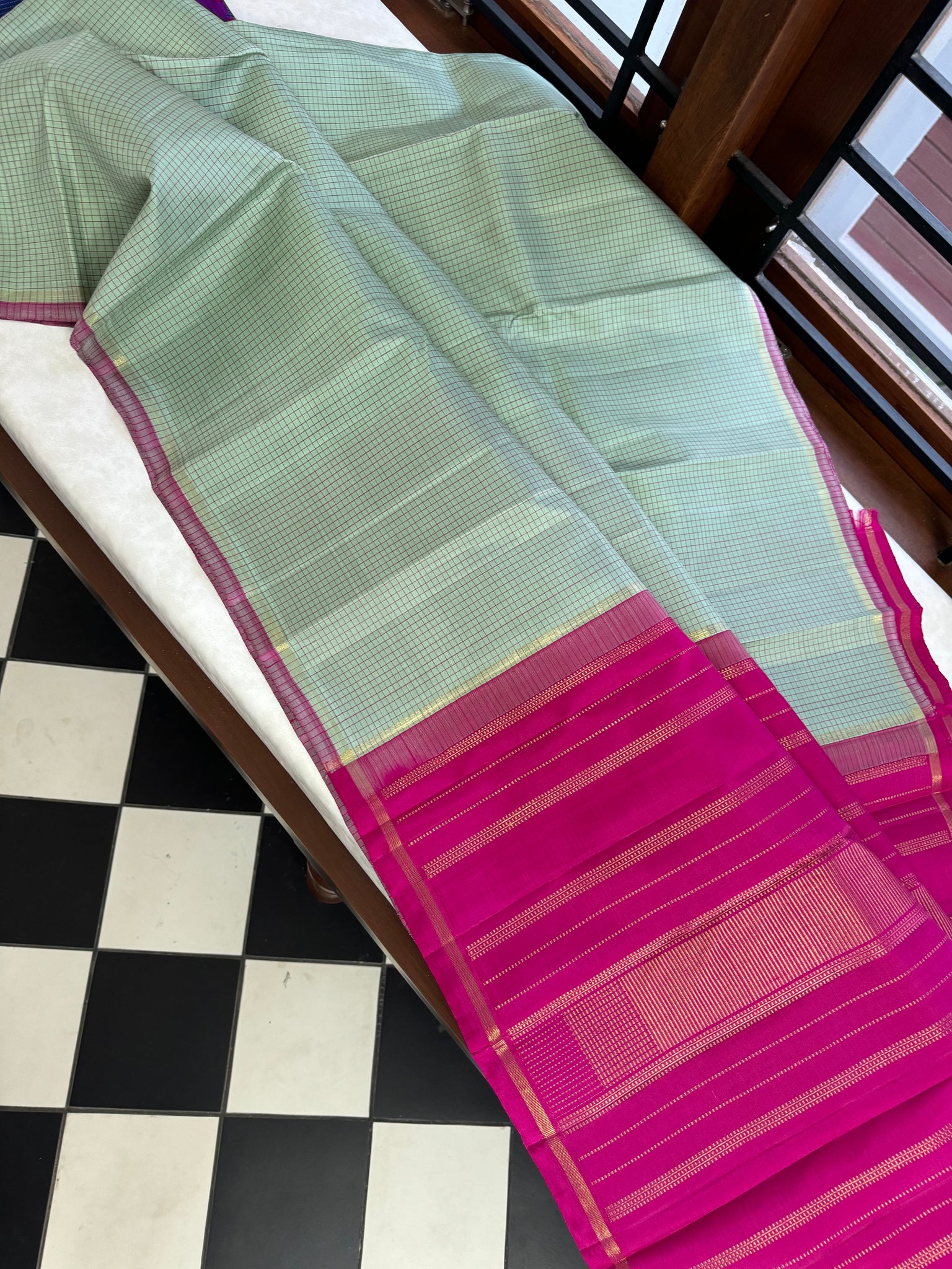 Adhyayam – The No Motifs Kanchivaram - a stunning pastel pista green podi kattam with rain pink pallu and blouse