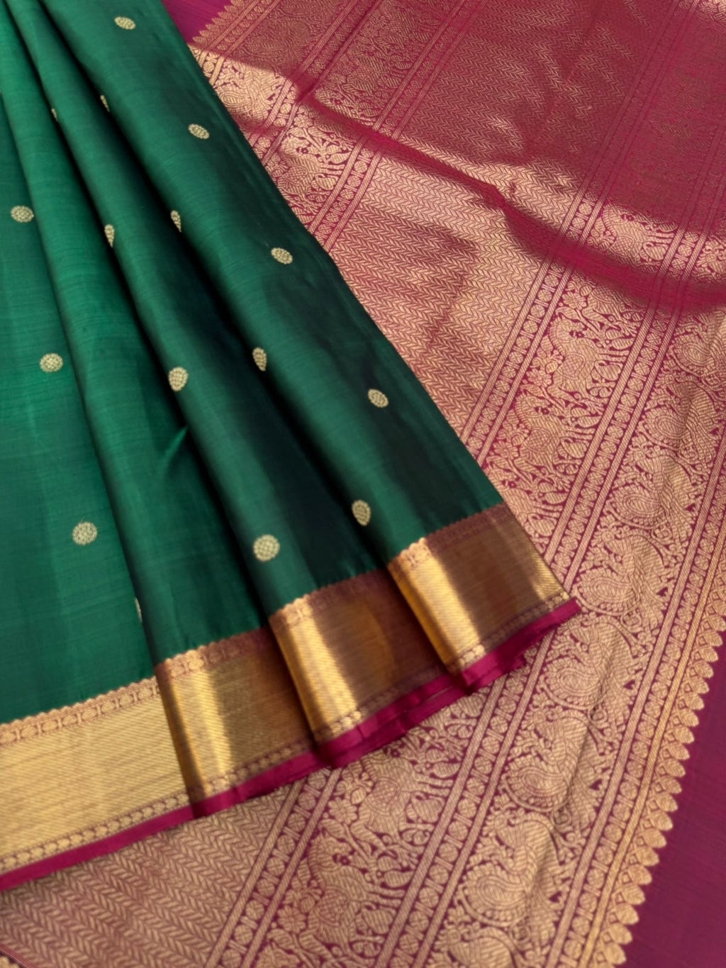 Colour Play on Kanchivaram - the beautiful deep dark meenakshi green with aaraku pallu and blouse with solid gold zari woven borders