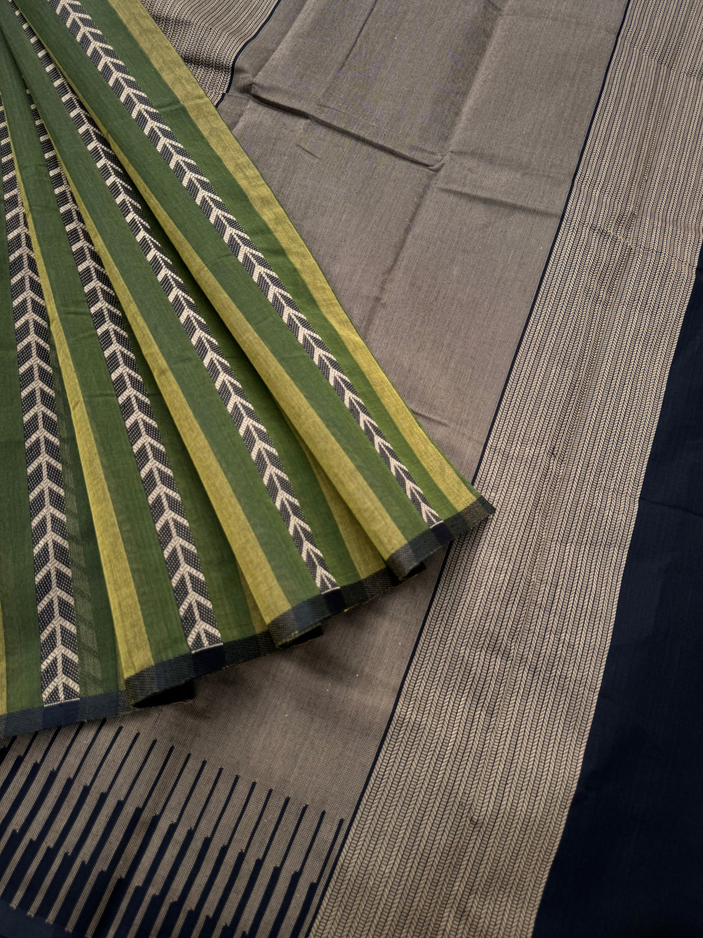 Corporate Style Mangalavastaram - shades of olive green vertical strips woven body with black pallu and blouse