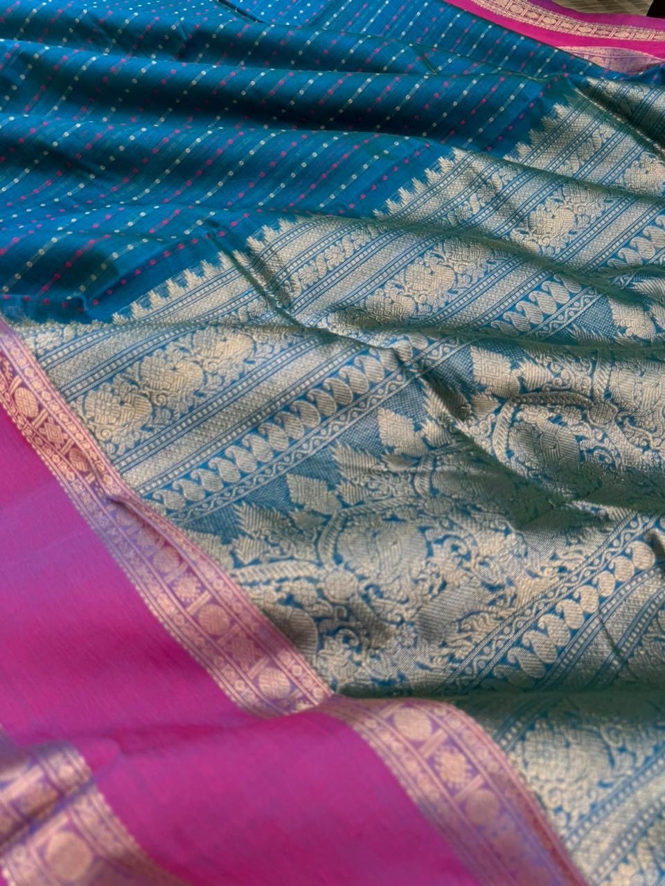 Woven Motifs Silk Cotton - a dark peacock blue lakshadeepam with retta pett woven borders