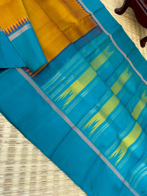 Rarest Korvai Kanchivaram - molten burnt golden honey a unusual tone with teal pallu blouse and borders