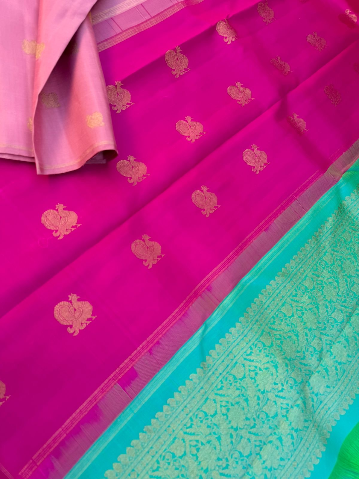 Uniquely Woven Kanchivarams - baby pink Mayil chackaram woven body with rain pink and aqua two colour woven long pallu