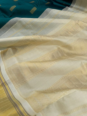 Korvai Silk Cottons - unusual dark Rama green and off white with body woven buttas