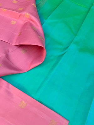 Uniquely Woven Kanchivarams - baby pink Mayil chackaram woven body with rain pink and aqua two colour woven long pallu