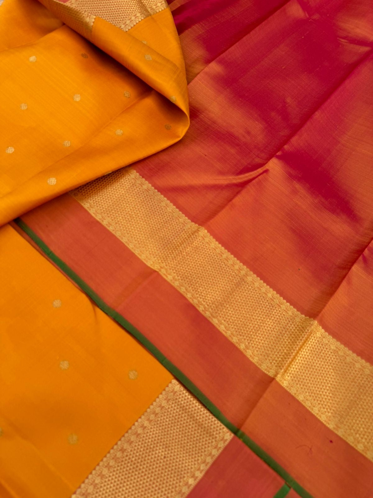 Colour Play on Kanchivaram - traditional at the best mustard and rust with aarai maadam woven borders with gorgeous grand pallu