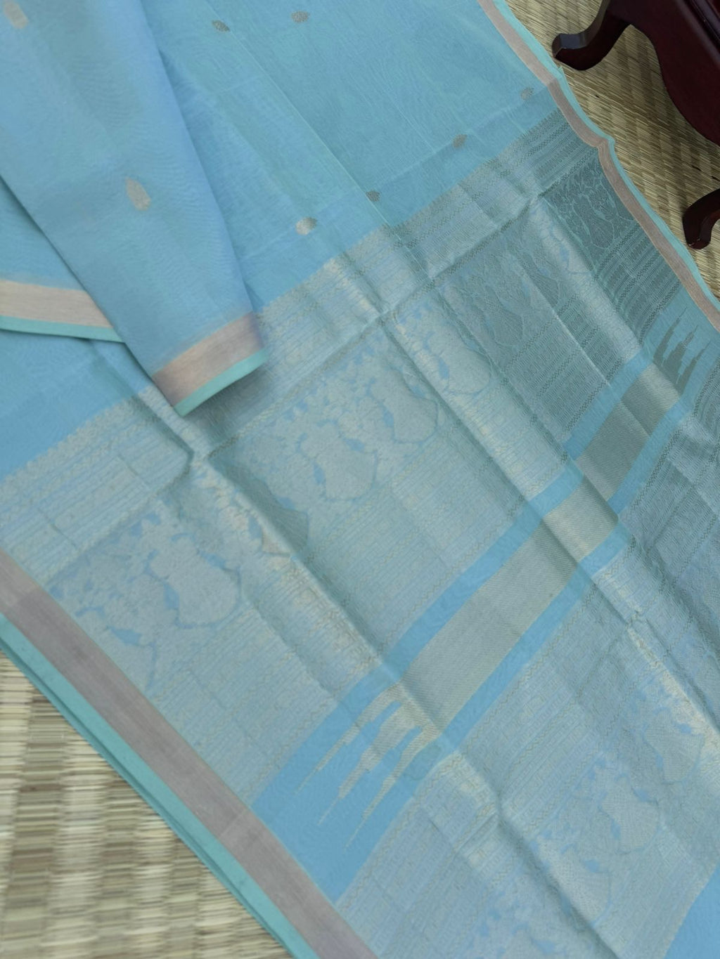 Pastels on Zari Kissed Silk Cotton - a pastel ice blue with one inch tissue borders and grand pallu ( u need to view this saree in natural light )