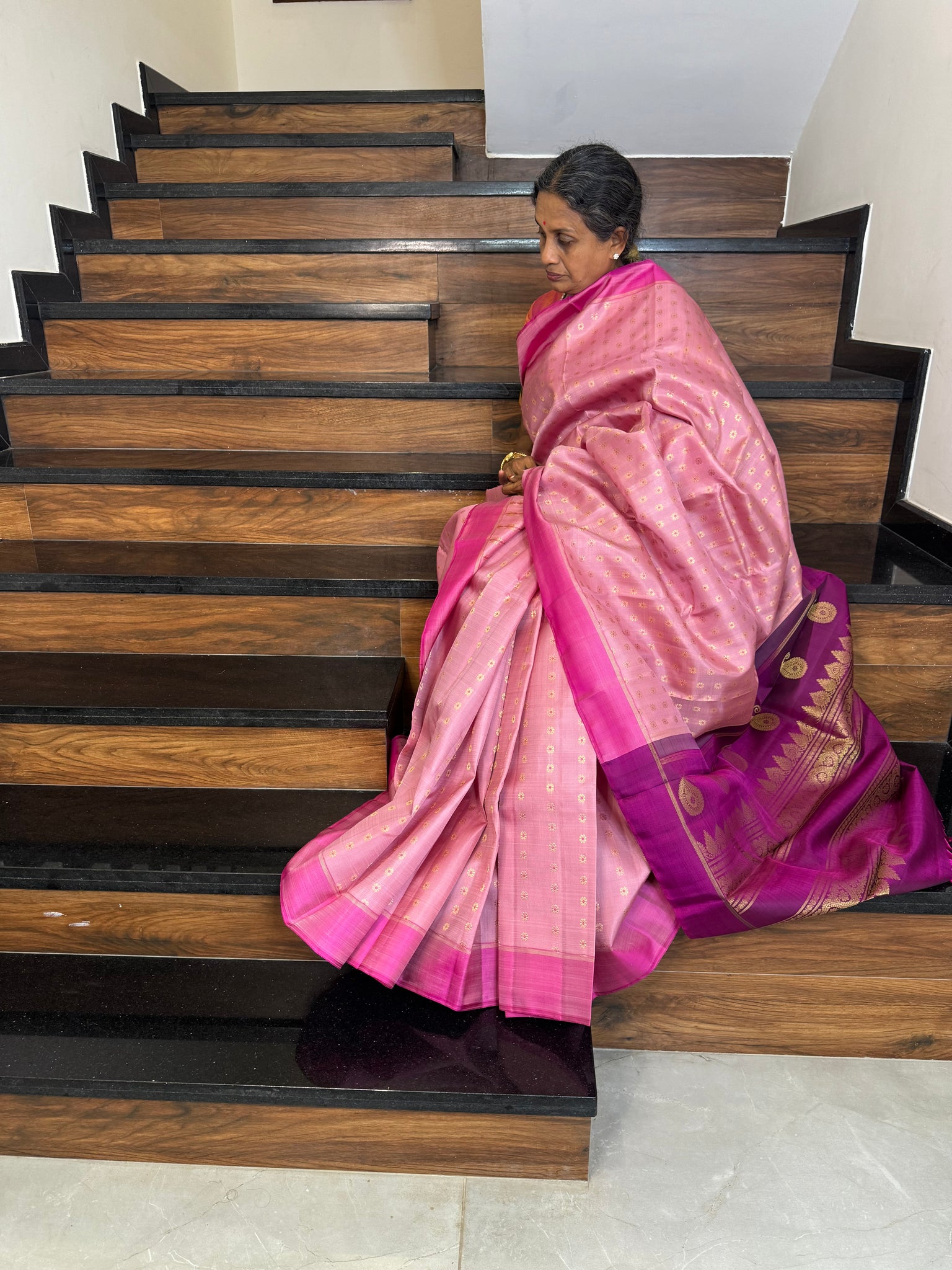 Kanchivaram Concepts - a gorgeous gorgeous baby pink full body meenakari gold zari buttas with majentha pallu and blouse