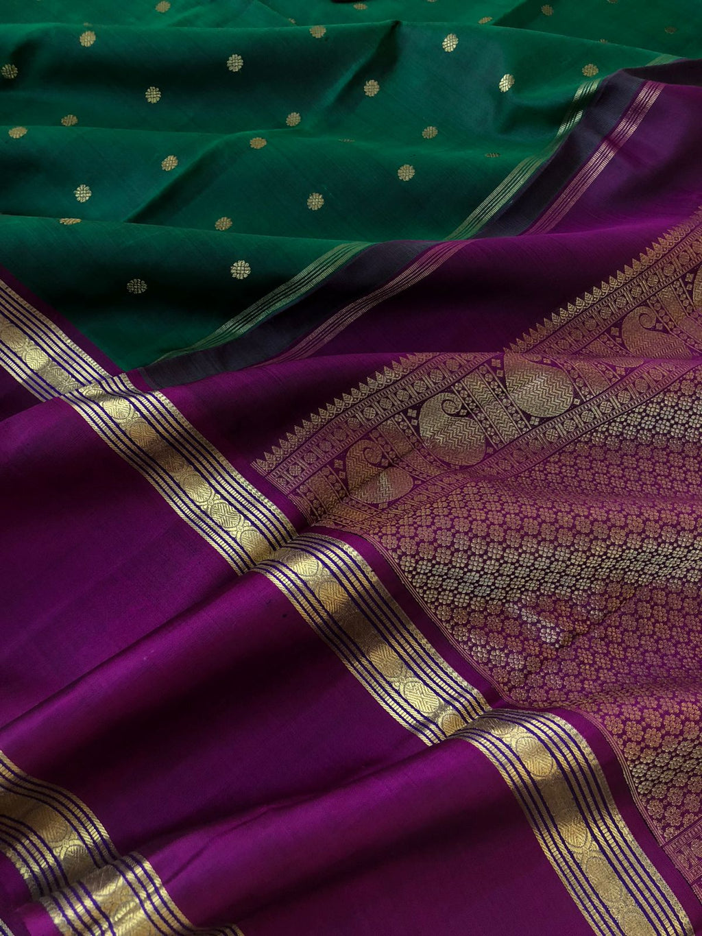 Swarnam - The Solid Kanchivarams - the traditional at the best Deepest dark Meenakshi green with dark purple with retta pett woven broad borders