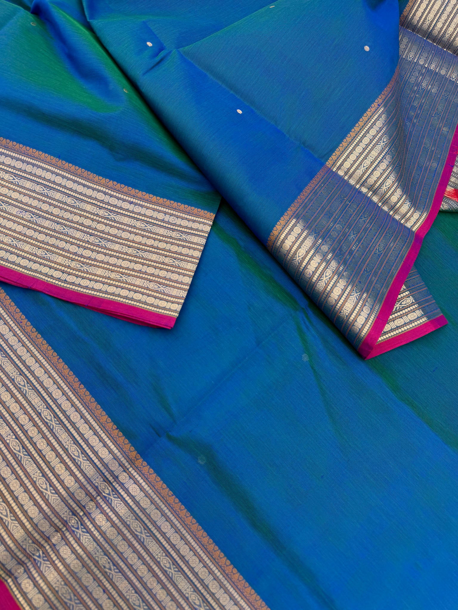 Zari Kissed Silk Cotton - a stunning dual tone peacock blue green with paithani pallu