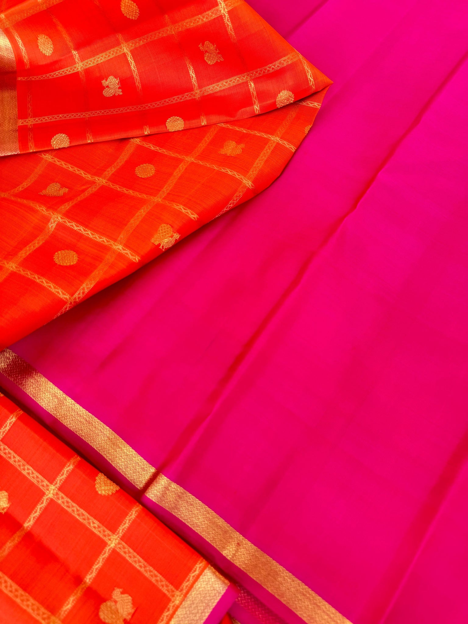 Aandal - The grandeur Kanchivaram - stunning orange and pink veldhari chex mayail chackaram