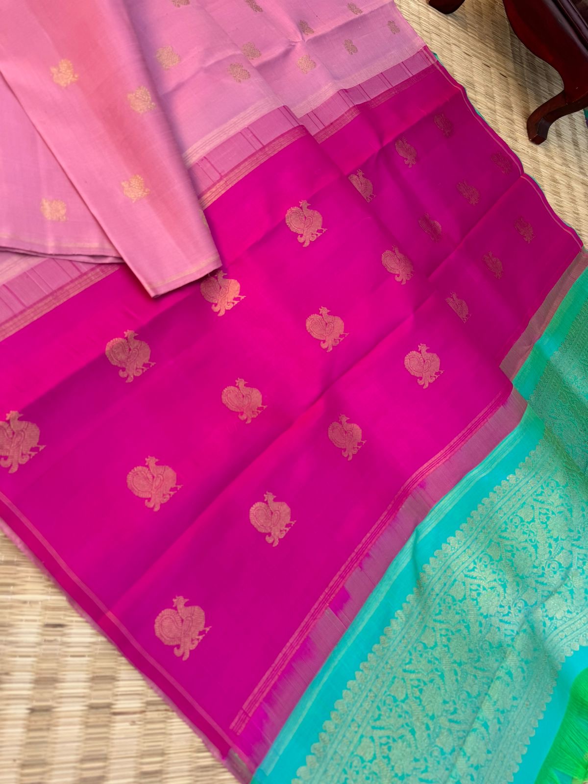 Uniquely Woven Kanchivarams - baby pink Mayil chackaram woven body with rain pink and aqua two colour woven long pallu