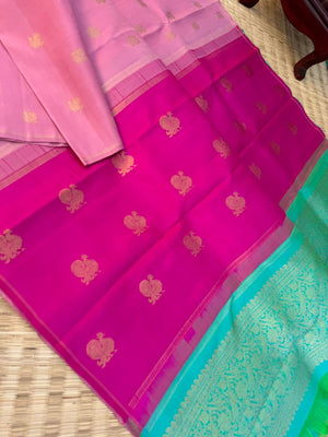 Uniquely Woven Kanchivarams - baby pink Mayil chackaram woven body with rain pink and aqua two colour woven long pallu