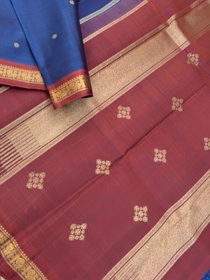 Leela - The bliss of small border Kanchivarams - rusty blue a unusual and rare tone with gorgeous chocolate tone pallu and blouse