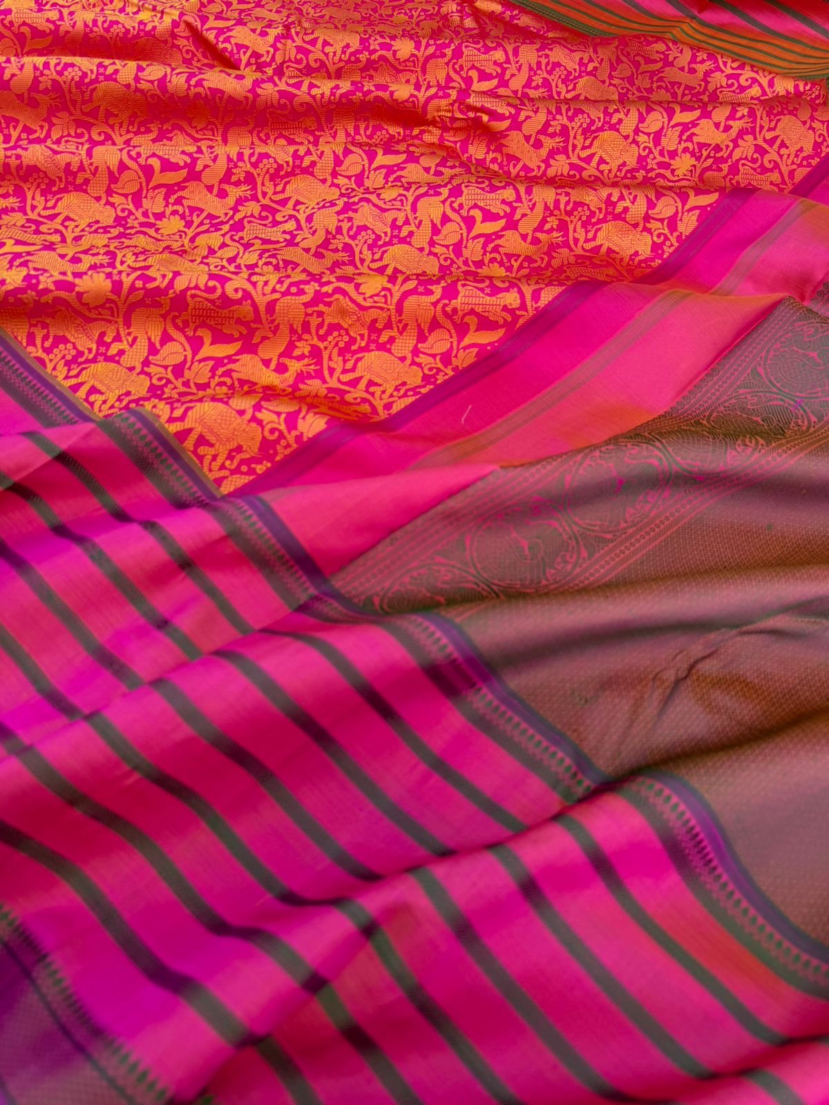 Vanasingaram on Kanchivaram - a pink base on motifs woven on mustard tone silk with varusai pett borders on no zari vanasingaram