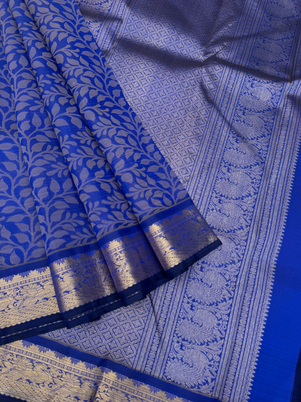 Haritham - Heirloom Yarn Play on Kanchivaram - stunning royal blue with full body woven leaves with gold zari woven borders and pallu