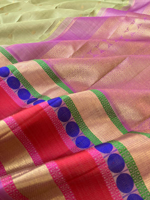 Statement of Kanchivaram - Something Different - most beautiful pastel pista green with zari and thread woven varusai pett borders