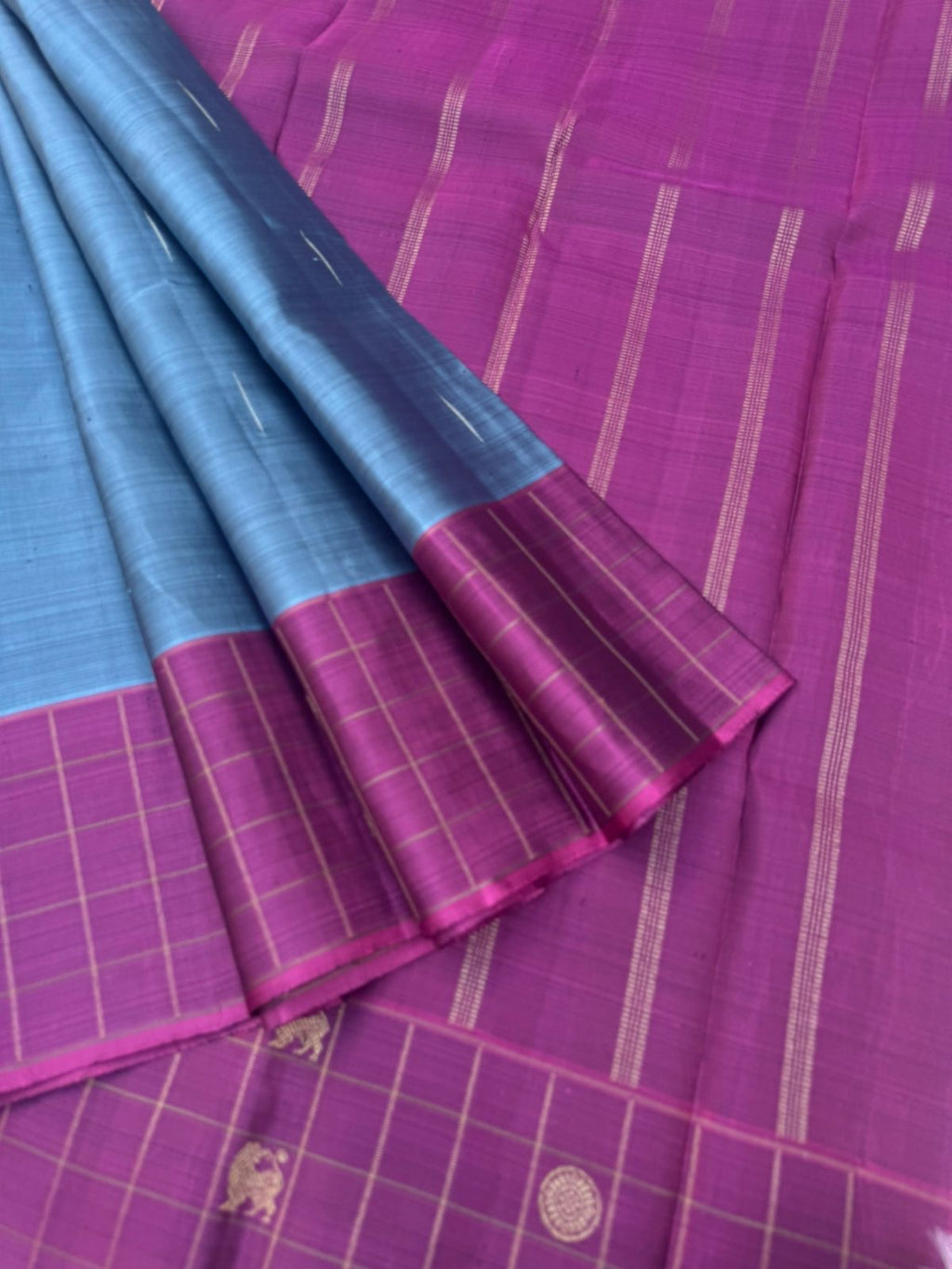 Shree - Simple and Elegant Kanchivarams - a bluish grey tone kanchivaram with raindrops woven buttas with yali and rudurakasham buttas woven chex borders