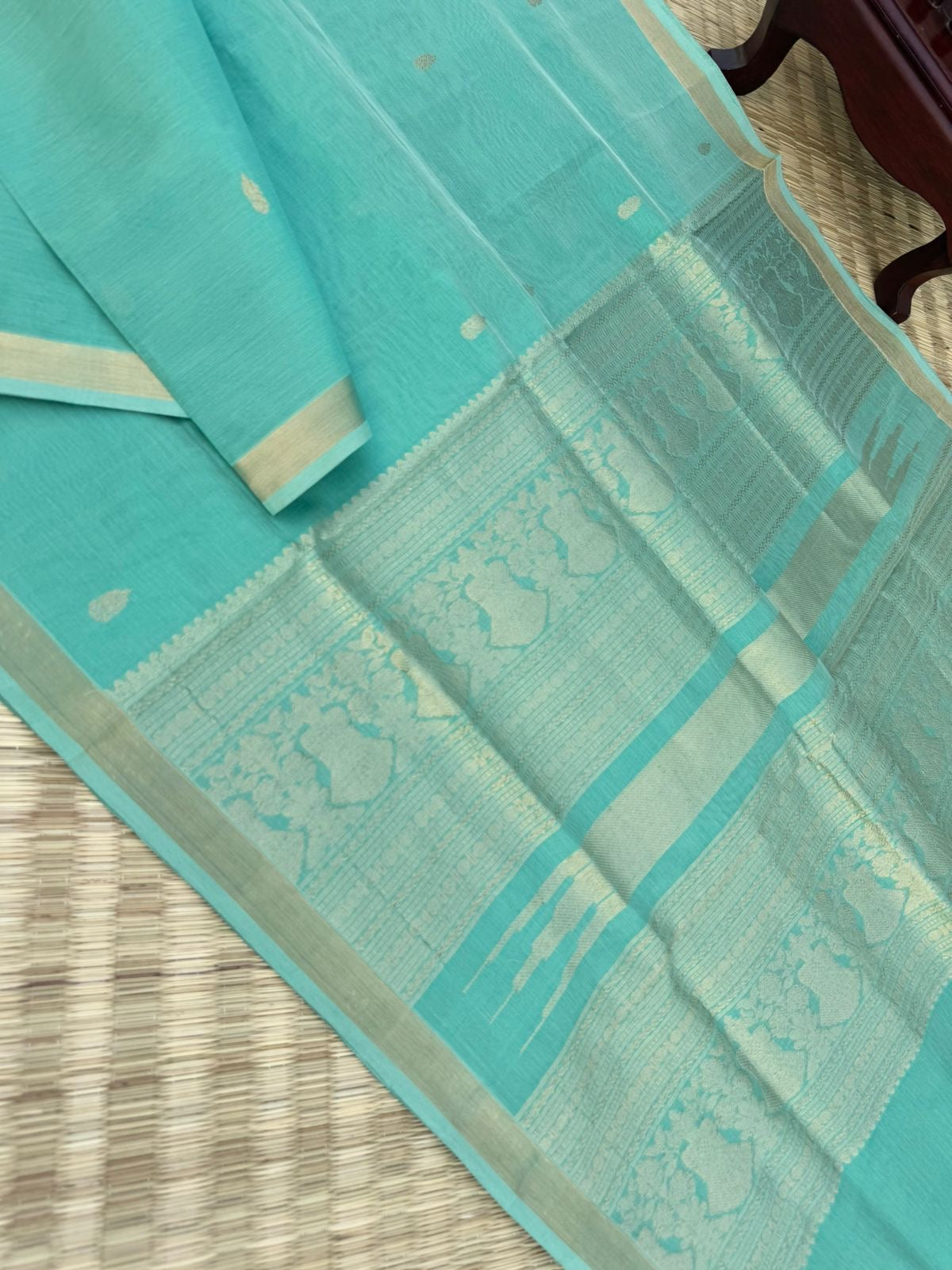 Pastels on Zari Kissed Silk Cotton - a pastel mint green with one inch tissue borders