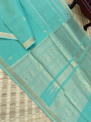 Pastels on Zari Kissed Silk Cotton - a pastel mint green with one inch tissue borders