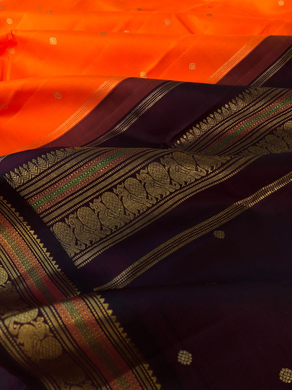 Varam - Kanchivarams Inspired from our Grandmother’s Trunk - beautiful fanta orange and deep beetle nut brown pallu with korvai woven annapakshi borders