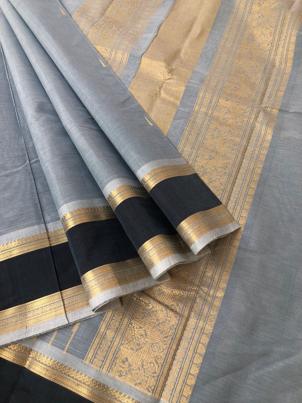 Mangalavastaram - Zari Touched - bluish grey with yali and killi woven corner buttas