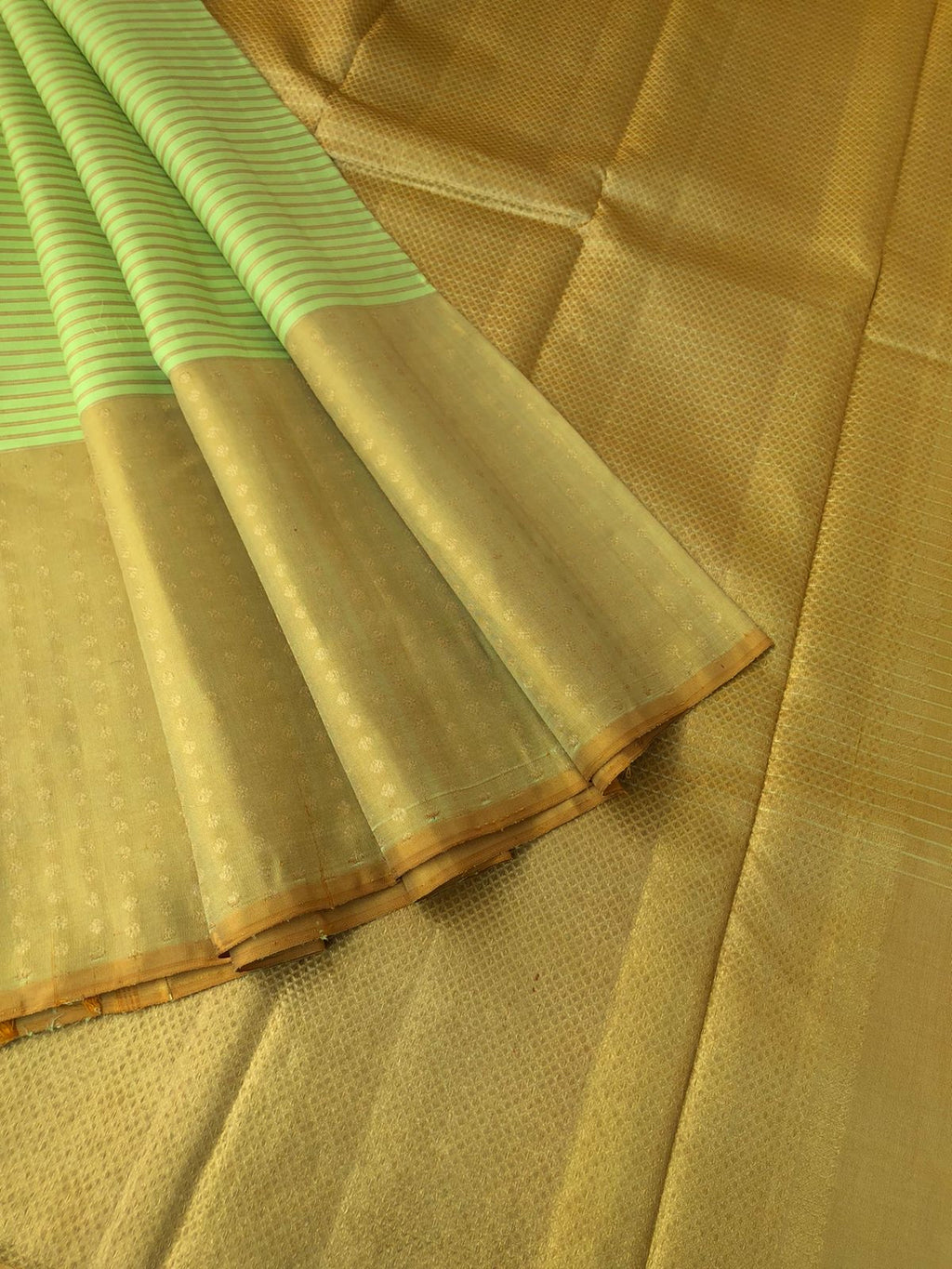 Meenakshi - Heirloom Kanchivaram - pastel pista ice cream and mustard broad woven Lakshadeepam borders with body zari stripes