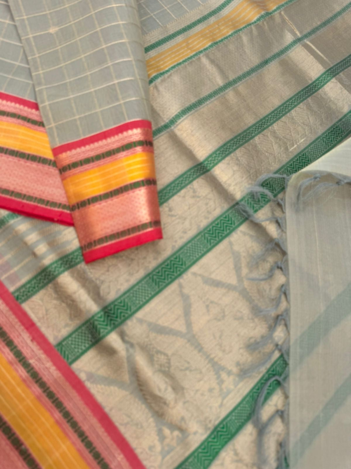 Pastels on Zari Kissed Silk Cotton - a unique unusual grey gold with different colours woven borders