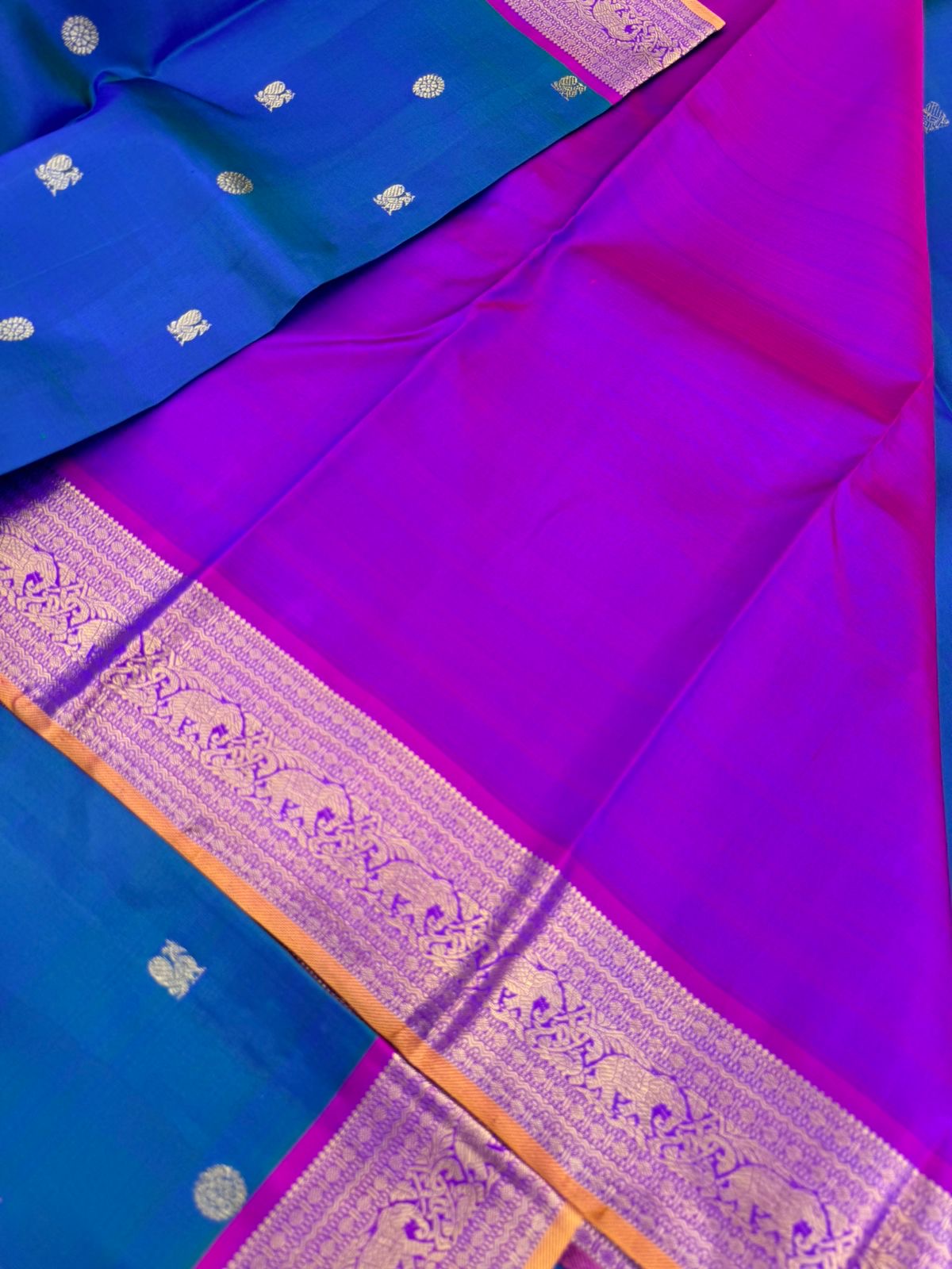 Valli - stunning peacock blue green with violet woven borders and pallu with traditional elephant woven borders