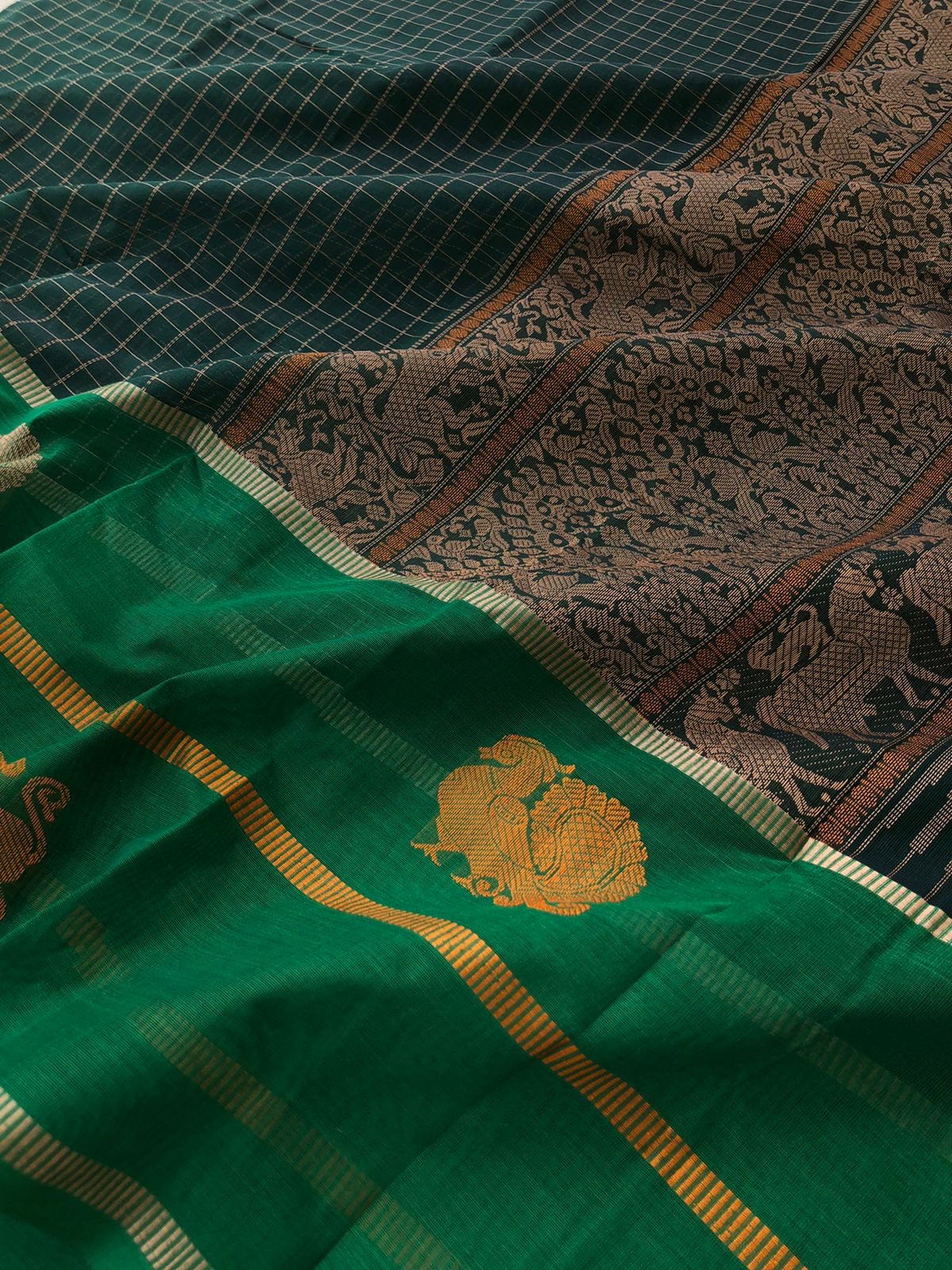 Mangalavastaram - grandest deep dark green muthukattam with ganga jammuna woven borders