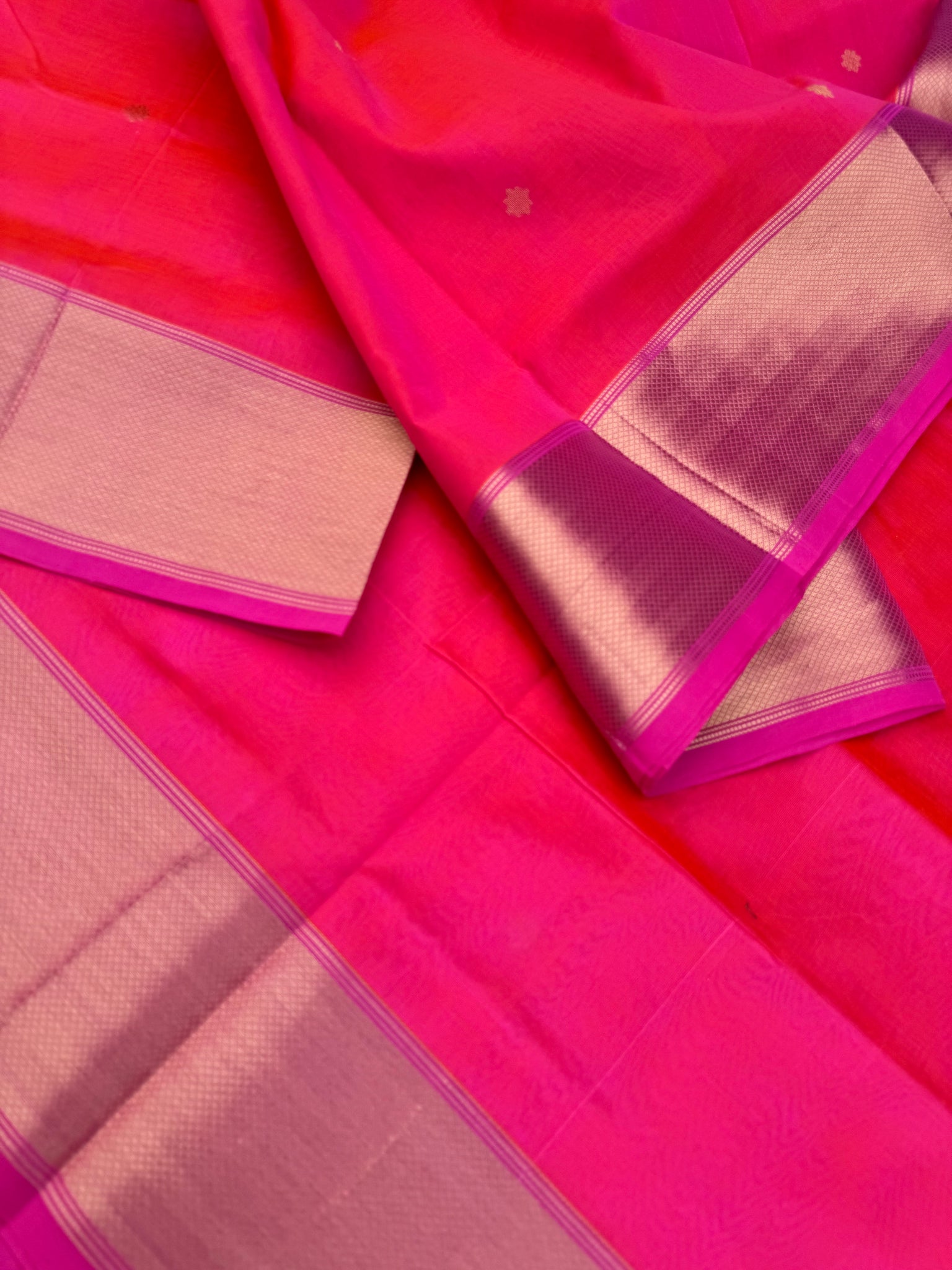 Zari Kissed Silk Cotton - a gorgeous vibrant shocking pink with corner buttas